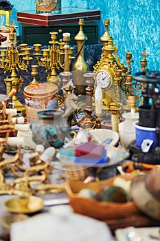 Golden clock on flea market in Paris