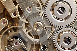 Golden Clockwork. Detail of watch machinery. Old mechanical pocket watch. Macro shot.