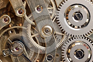 Golden Clockwork. Detail of watch machinery. Old mechanical pocket watch. Macro shot.