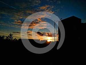 Golden Clouds on Blue sky during Sunset