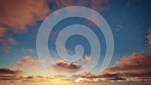 Golden clouds on the starry sky and sun in the morning