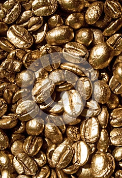 Golden coffee beans texture background.