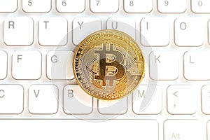 Golden coin crypto currency bitcoin keyboard