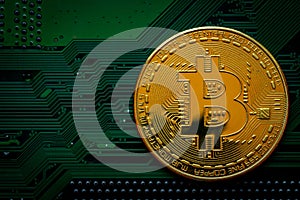 Golden coins with bitcoin symbol on green mainboard circuit background. Cryptocurrency, Money coin digital. Blockchain technology