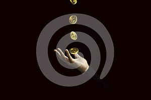 Golden coins falling to businessman hand for receive money from income or profit concept , coins element by 3d render