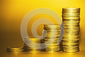 Golden coins gold color tone staking step for valuable wealth growing income concept
