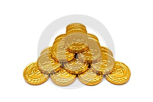 Golden coins isolated on white background.