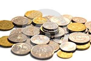 Golden coins isolated on white background