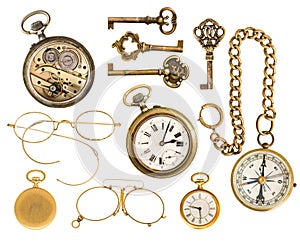 Golden collectible accessories. antique keys, clock, glasses, co