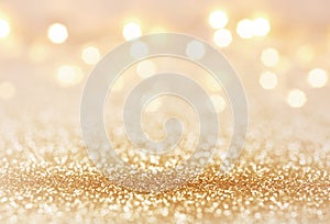 Golden color abstract glitter texture background for holidays photo