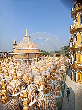 golden colored minaret view of masque