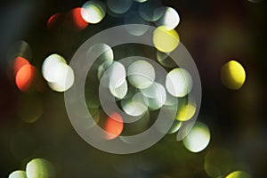 Golden colorful silver dark circular lights in pastel colorful hues, background, bokeh