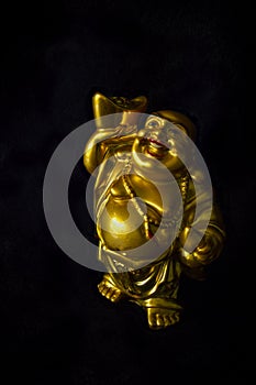 Golden colour happy Buddha statue