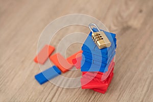 A golden combination lock on the building block