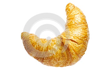 Golden croissant isolated on white background