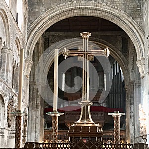 golden cross inside St. Bartholomews church in London