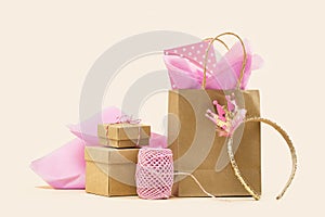 Gift or Sale concept. Shopping paper bag, Crown headband with pink tissue