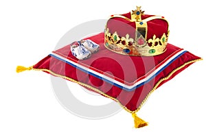 Golden crown on velvet pillow in Holland