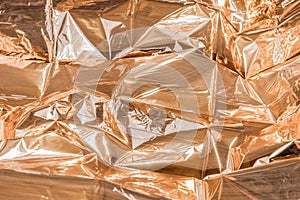 Golden crumpled foil texture