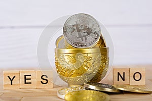 Bitcoins cryptocurrency Yes Or No concept. photo