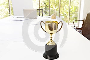 Golden cup isolate on background.Copy space.