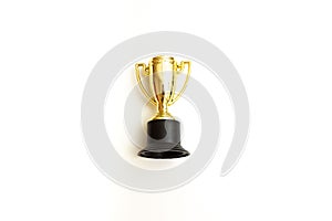 golden cup trophy isolated on white background photo