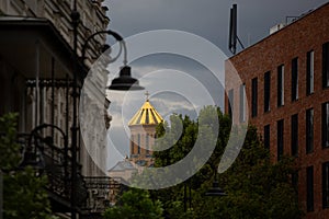 Golden Cupola Church in Cityscape