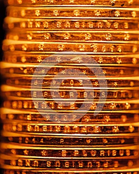 Golden dollar coins stack backdrop