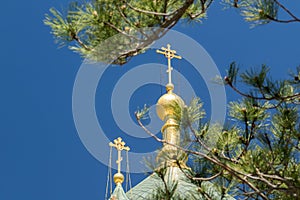 The golden dome and crosses of the Orthodox Church of the Holy Resurrection of Christ in Yalta near the place Baydarskie Gates