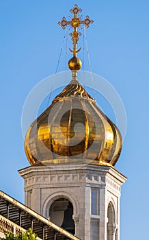 Golden dome of the Orthodox Church in a sunny day photo