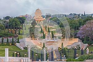 The golden-domed Shrine of the Bab. Terraces of the Bahai Faith, the Hanging Gardens in Haifa, Israel photo