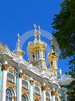 Golden domes of the Catherine Palace Church in Pushkin city, suburb of St. Petersburg, Russia. Favorite place for excursions for t