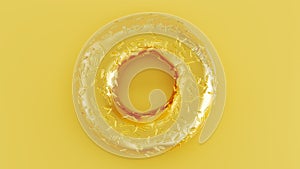 Golden donut with golden glaze on golden background,