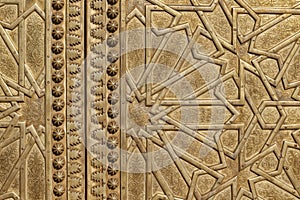 Golden door detail of the royal palace gate in Fez, Morocco