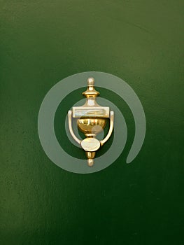 Golden door knocker