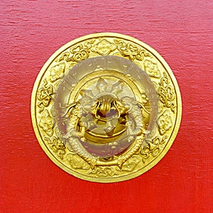 Golden door knocker at Kapan buddhist monastery