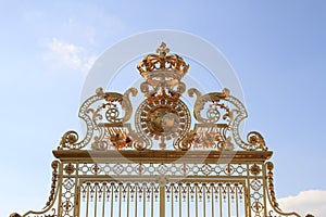 The golden door of the Palace of Versailles, France