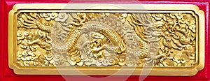 Golden dragon(Chinese: Long) wood carving photo