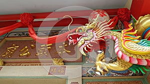 Golden dragon guarding the Chinese shrine