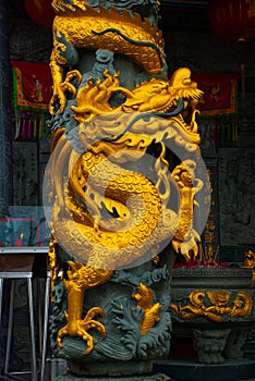 Golden dragon on the pole. Tua Pek Kong Chinese Temple. Bintulu city, Borneo, Sarawak, Malaysia