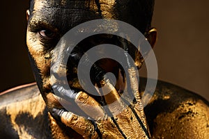 Golden Driller close-up portrait. Hard Work Concept