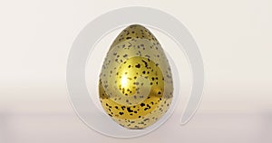 Golden Easter egg with black terrazzo pattern rotates on beige background, spring April holidays card, 3d animation