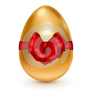 Golden Easter egg with red bow