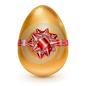 Golden Easter egg with red bow