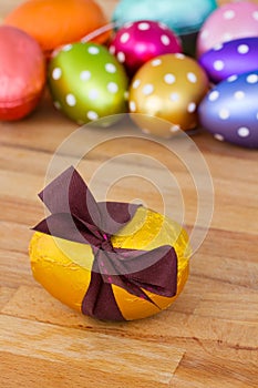 Golden easter egg on wooden table