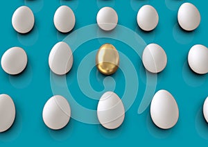 Golden egg in a group of regular white eggs, standing out