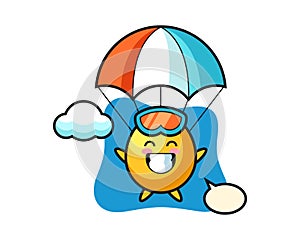 Golden egg mascot cartoon is skydiving with happy gesture