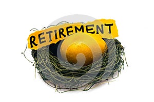 Gold Egg in Nest Egg with Text Retirement