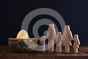 Golden egg in nest. Concept of investments, savings and pensions