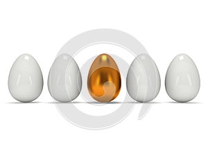 Golden egg in a row of the white eggs